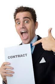 A salesman holding a contract for you to sign. 